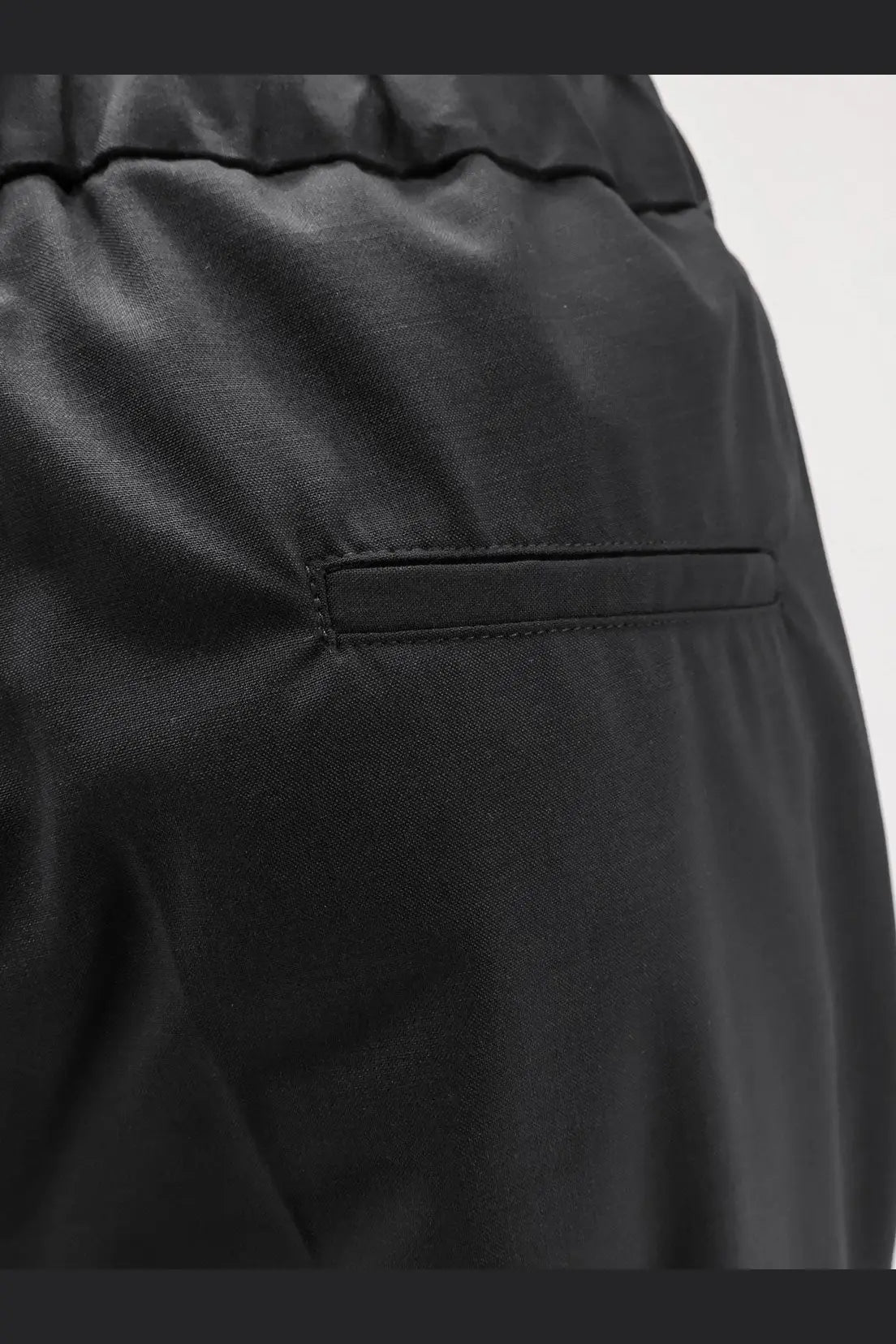 Hevò men’s torre chianca black linen and viscose trousers with subtle sheen and stitched pocket detail