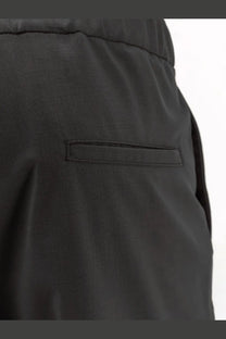 Hevò men’s torre chianca wool blend trousers black with sleek fabric, subtle sheen, and side rectangular pocket