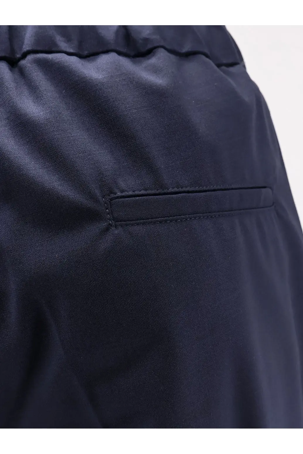 Hevò men’s torre chianca wool blend trousers in dark navy blue with smooth texture and stitched front pocket