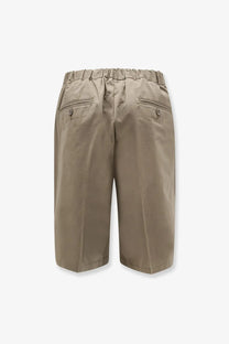 Beige cotton shorts with elastic waistband and two back pockets shown from the back side for hevò men’s outfit