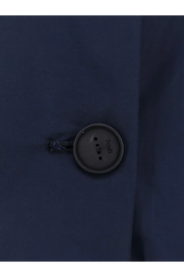 Dark gray button with hvo engraving on navy blue cotton blend fabric of hevò womens cala paradiso raincoat blue