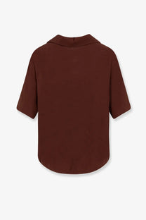 A sleek dark brown short-sleeved modal blend blouse with collar and curved hemline by Hevò women