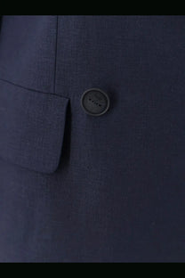 Dark blue linen and viscose suit jacket button with subtle metallic finish and embossed hevò logo for women