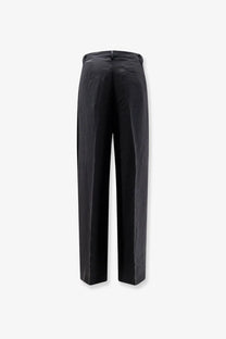 Black satin Hevò women’s Torreveneri modal blend trousers with sleek straight-leg cut and subtle back pleats shown from the back