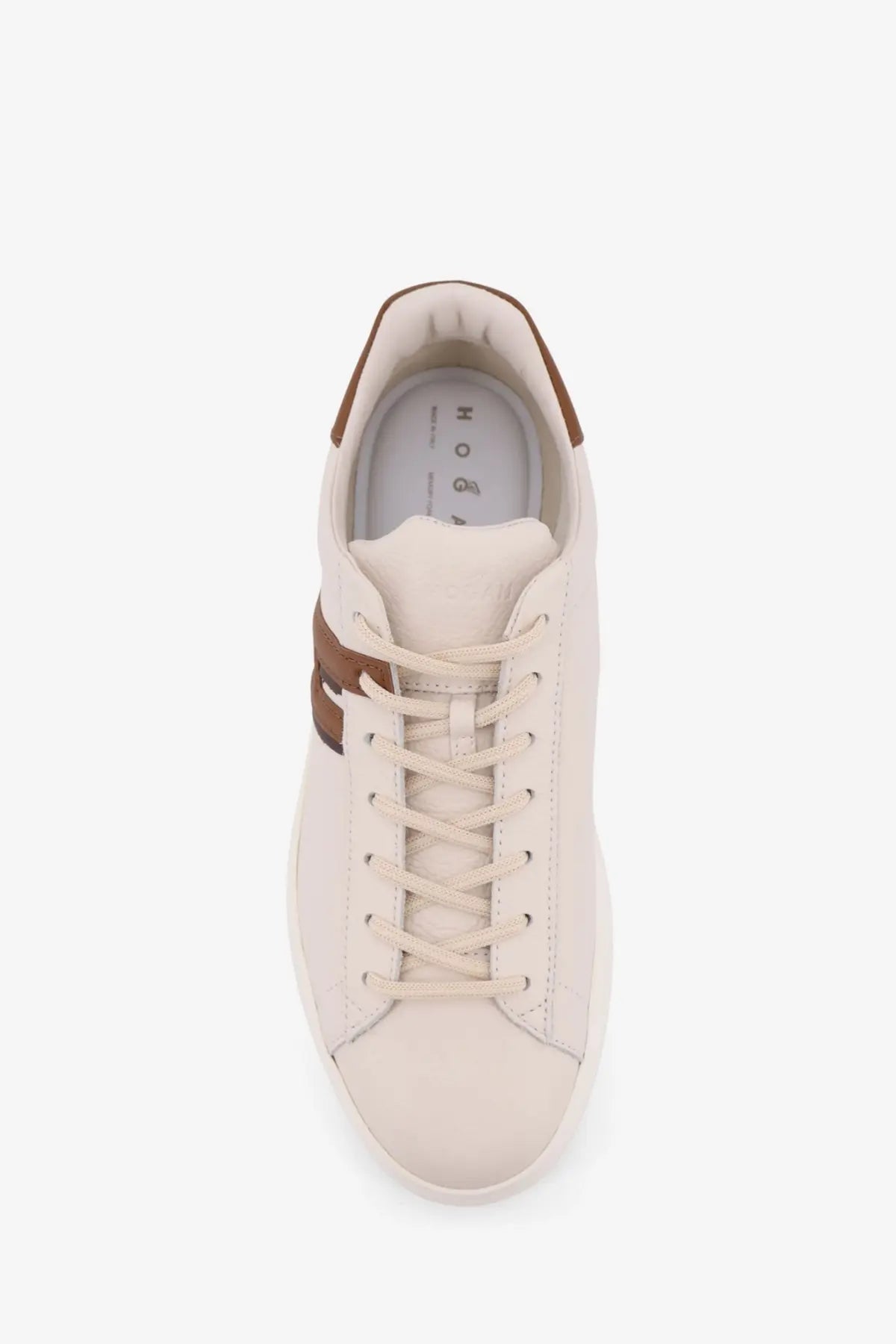 Hogan men’s leather sneaker in cream with brown heel and side stripe featuring a minimalist design