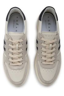 Cream-colored Hogan men’s sneaker beige with black accents and suede upper for casual wear
