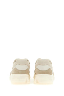Hogan men’s sneaker beige featuring a beige and white chunky design with suede and mesh upper and thick translucent sole