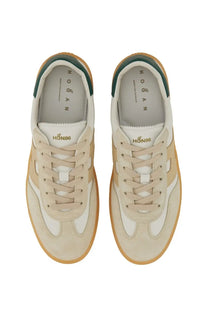 Beige and white hogan men’s sneaker cool white with green heel tab showing the back side of the shoe