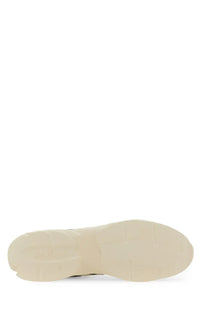 Cream-colored rubber sole with textured grip and subtle embossed branding on hogan men’s sneaker grey