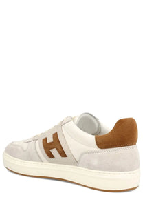 Hogan men’s grey low-top sneaker in white and tan suede with a prominent brown h logo on the side