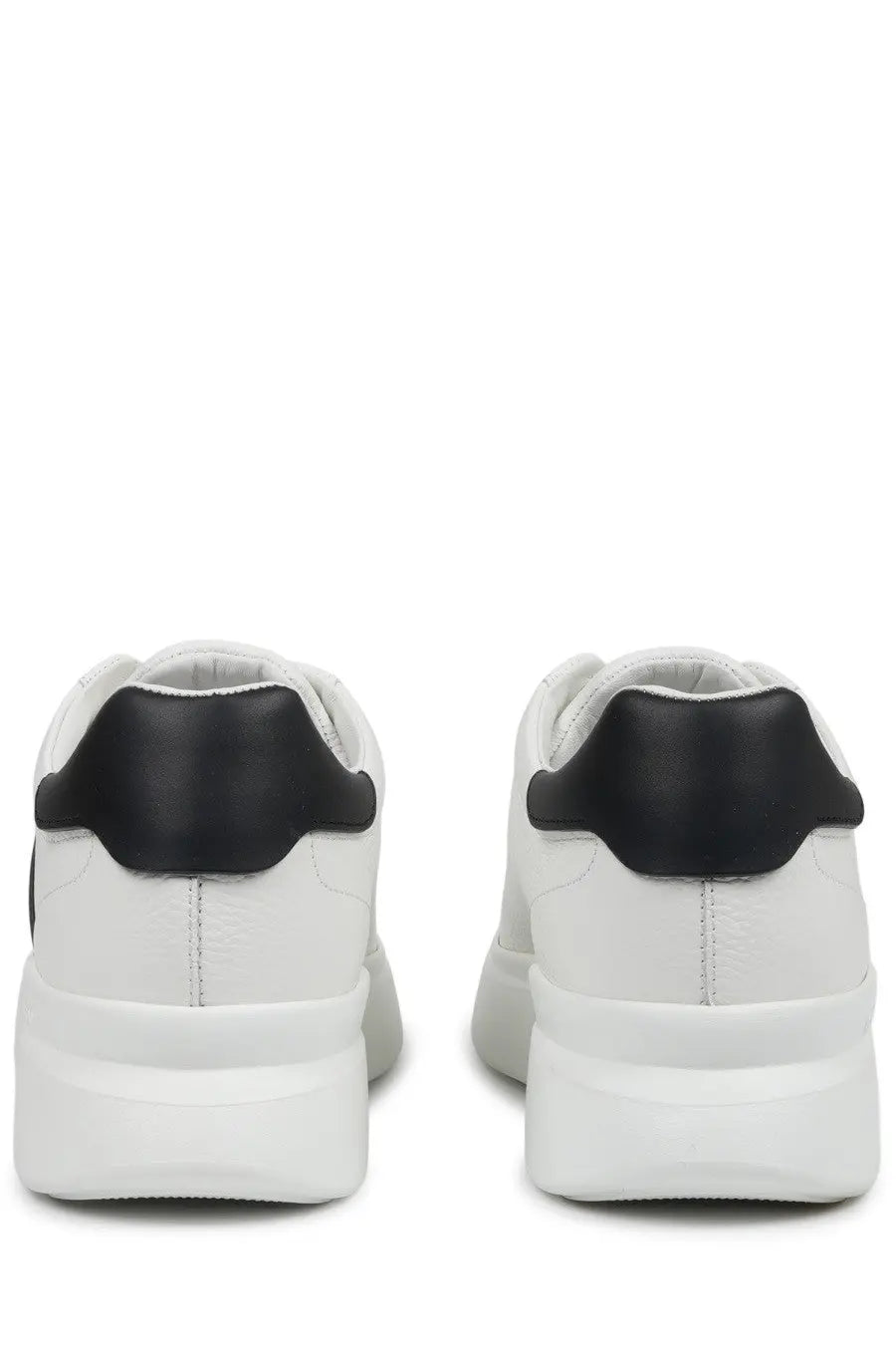 Hogan men’s sneaker h580 white featuring white leather with black rubber heel tabs and a chunky white sole