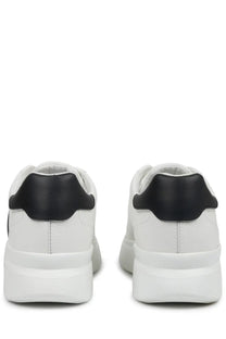 Hogan men’s sneaker h580 white featuring white leather with black rubber heel tabs and a chunky white sole