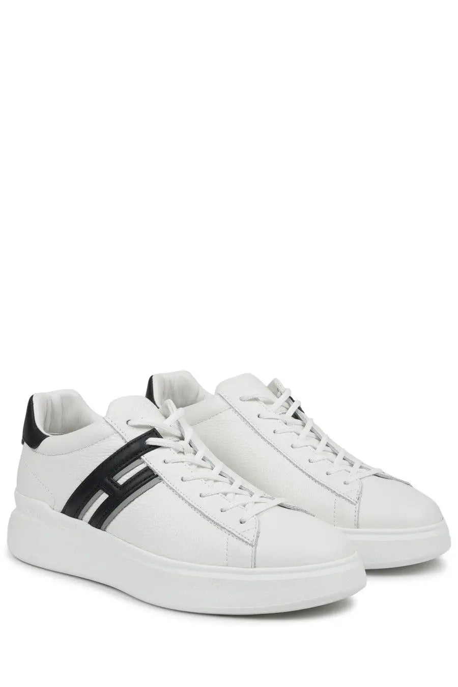 Hogan men’s sneaker h580 white leather with black stripe and heel tab featuring chunky white sole