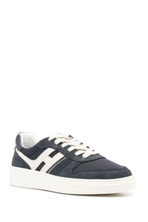 Hogan men’s sneaker h630 in pelle blue features dark navy suede mesh low-top with white laces and off-white sole