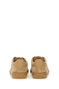 Tan suede low-top sneaker with matching rubber sole from hogan men’s sneaker h691 beige collection