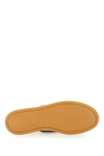 Tan rubber sole with smooth slightly curved profile on the back of hogan men’s sneaker multicolor