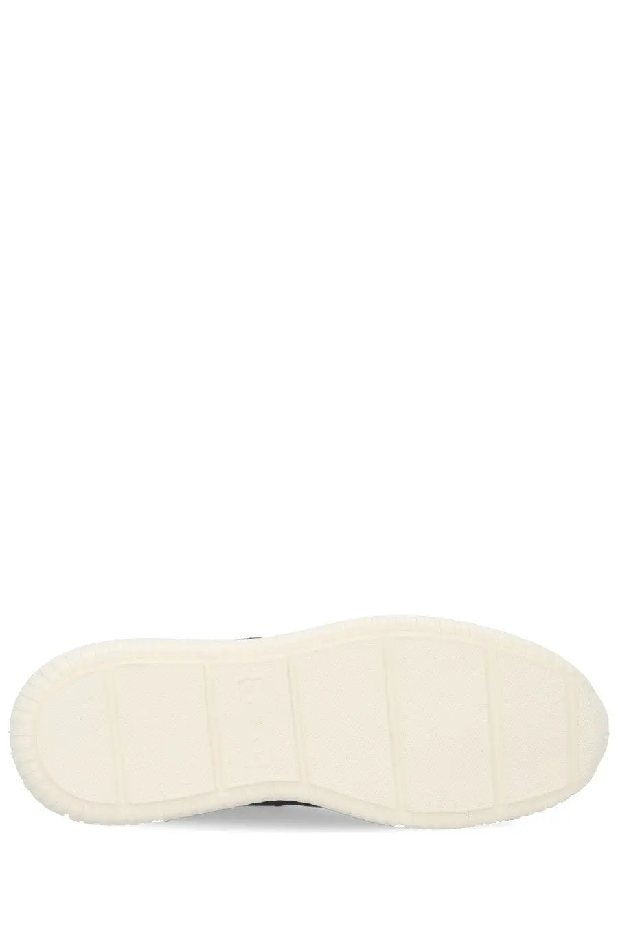 Cream-colored rubber sole with chunky block design on hogan men’s blue suede sneaker side view