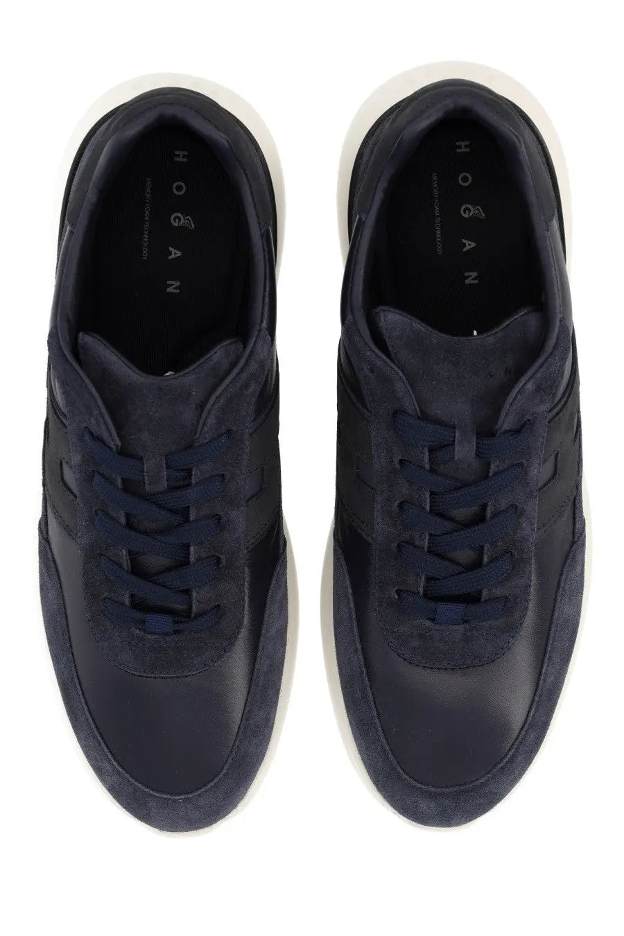 Hogan men’s suede sneaker blue featuring dark blue suede and leather with white soles and Hogan logo on the insole
