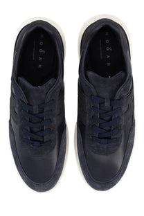 Hogan men’s suede sneaker blue featuring dark blue suede and leather with white soles and Hogan logo on the insole