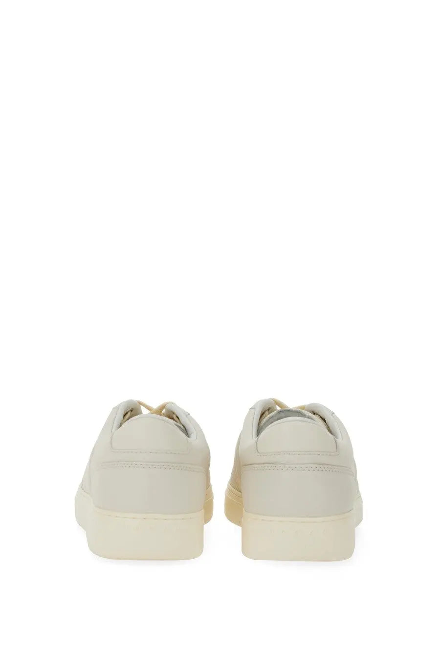 Cream-colored leather low-top Hogan men’s Hogan TV sneakers with minimalist design and matching rubber soles