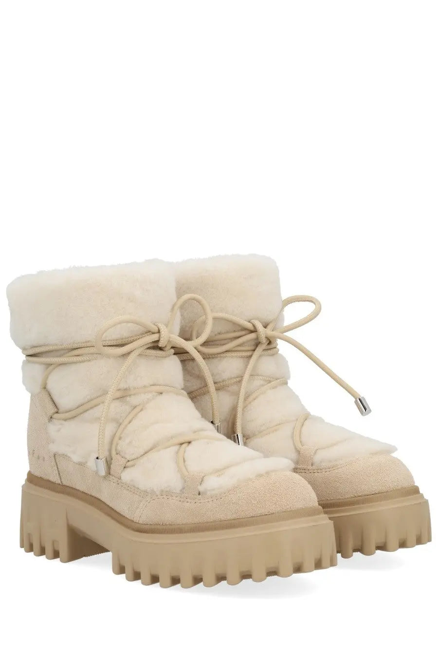 Cream-colored hogan women’s ankle boots h700 beige with quilted design plush shearling lining and chunky rubber soles