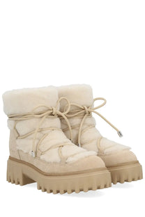 Cream-colored hogan women’s ankle boots h700 beige with quilted design plush shearling lining and chunky rubber soles