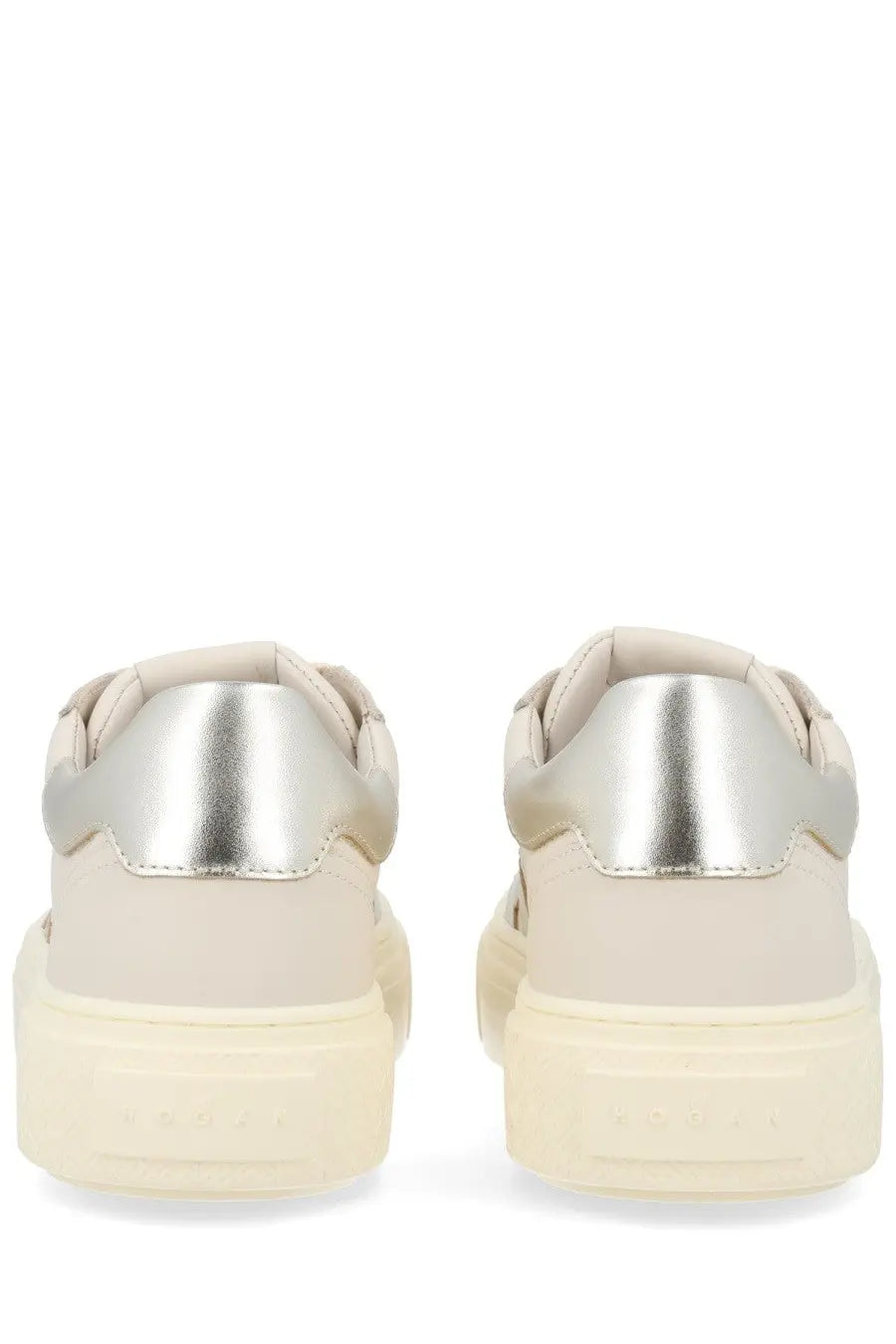 Hogan women’s crosswind sneaker white cream leather with metallic silver heel accent and chunky off-white rubber sole back view
