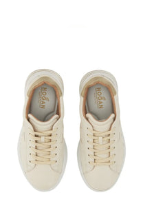 Cream-colored hogan women’s rebel sneakers with sleek minimalist design and subtle tan inner lining accents