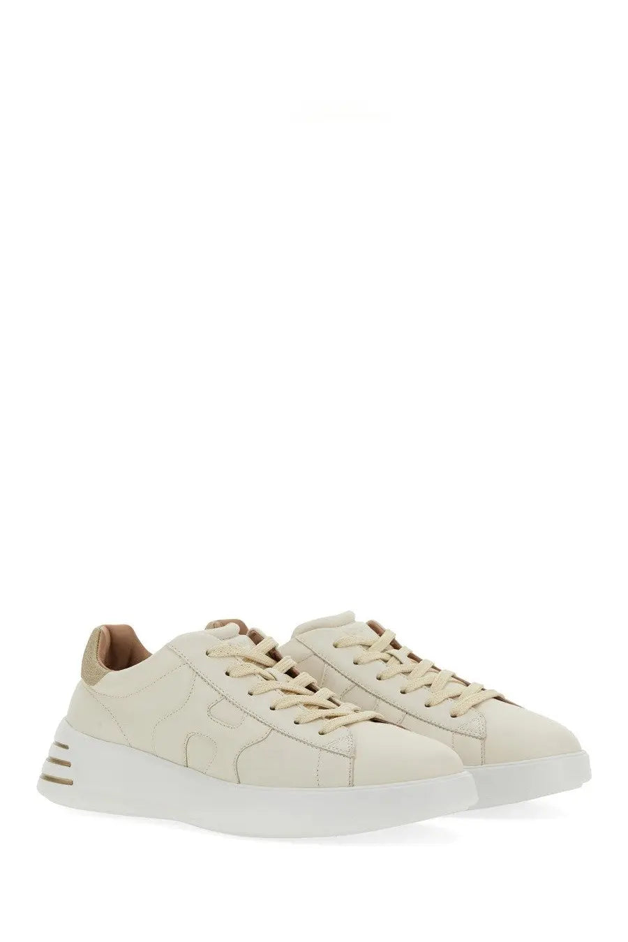 Cream-colored suede hogan women’s rebel sneaker with white rubber sole and beige laces in multicolor design