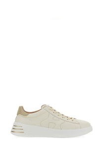 Back view of cream-colored suede hogan women’s rebel sneaker with white rubber sole and gold-tone heel stripes