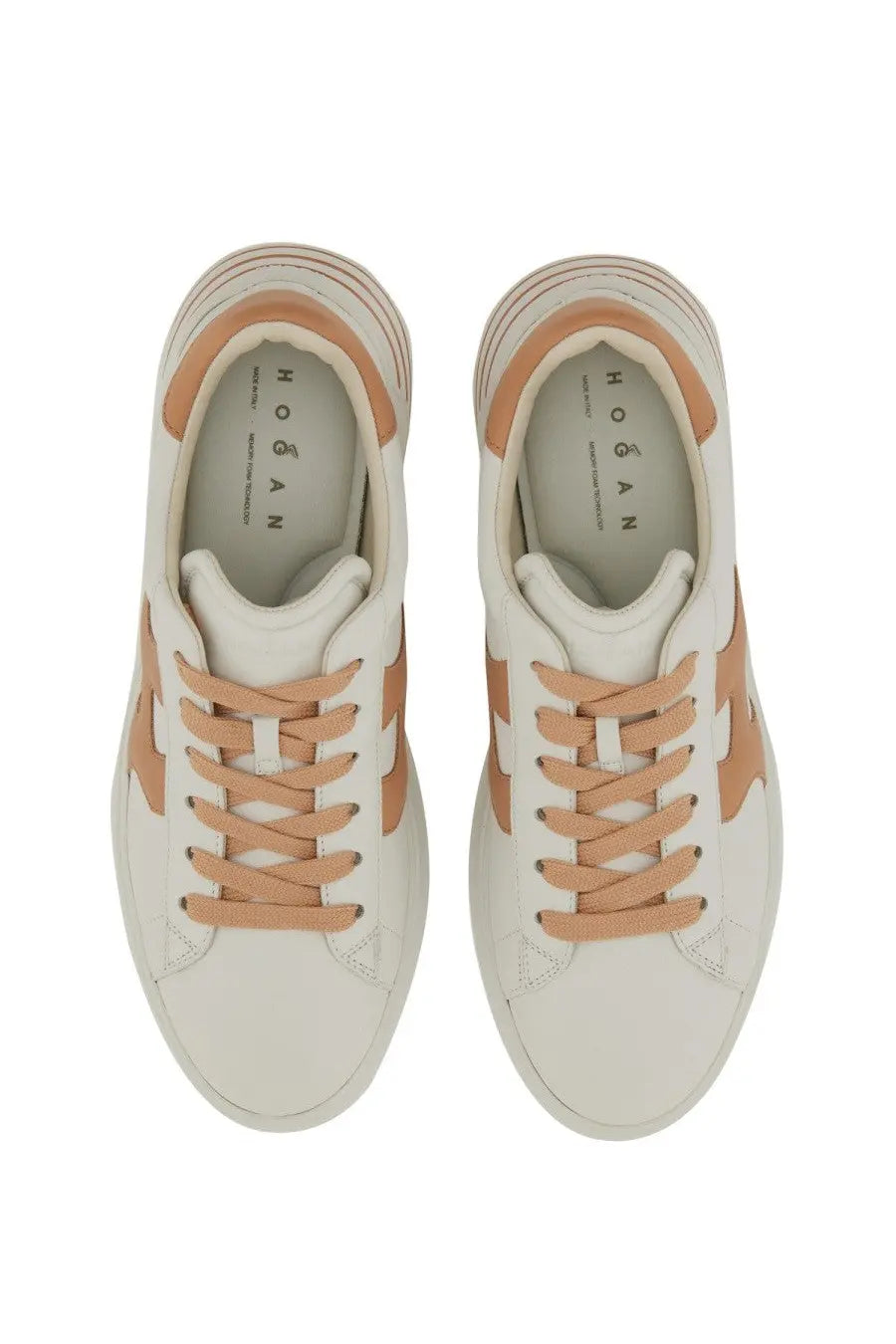 Cream-colored Hogan women’s Rebel sneakers with tan leather accents and laces for casual wear