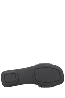 Black rubber sole with stitched detailing and embossed Hogan brand name on Hogan women’s Sandalo flat black sandal
