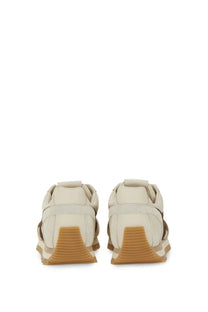 Cream-colored leather hogan women’s sneaker 86er beige with tan rubber soles and brown accents