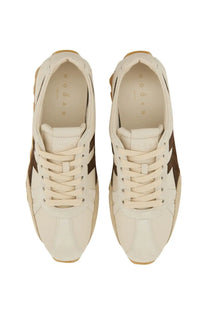 Hogan women’s sneaker 86ER beige cream-colored with brown side stripes and matching gum sole for casual wear