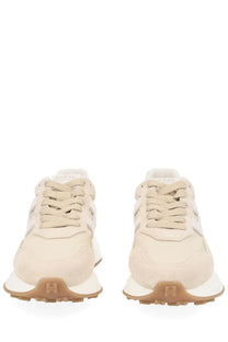Hogan women’s sneaker beige cream-colored suede with beige laces and tan rubber sole for casual wear