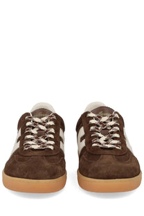 Hogan women’s sneaker cool brown suede with white stripes cream laces and gum rubber sole front view