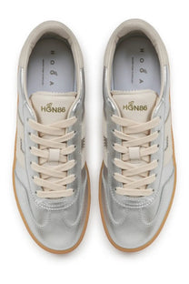 Hogan women’s sneaker cool silver in silver with cream laces and tan rubber sole for casual wear