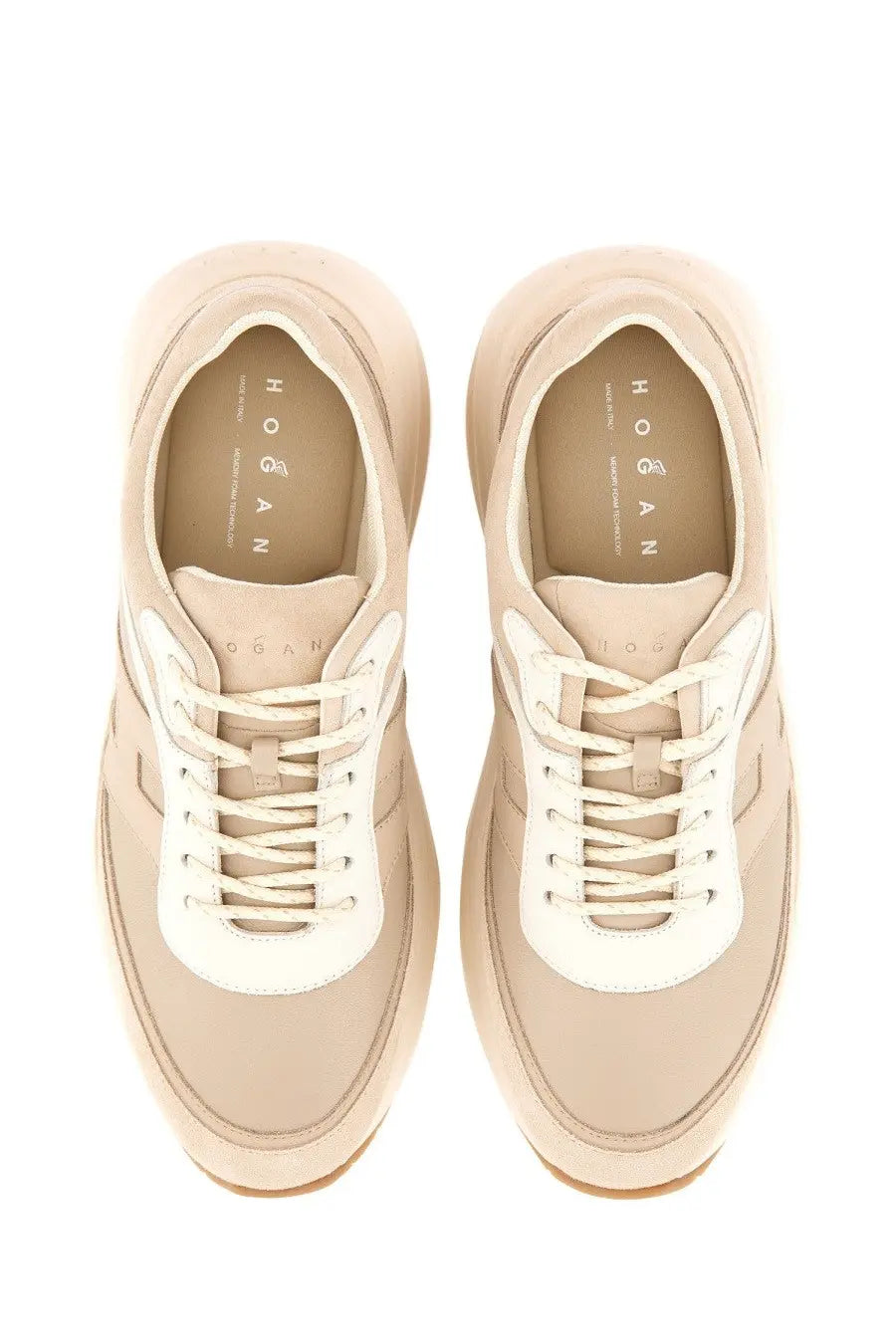 Beige hogan women’s sneaker h696 with white laces and a sleek modern design in lightweight material