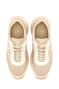 Beige hogan women’s sneaker h696 with white laces and a sleek modern design in lightweight material
