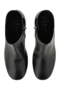 Hogan women’s stivale h695 black leather ankle boots with glossy finish and silver zipper accents
