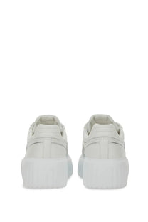 Hogan women’s stripe sneaker white leather with chunky translucent rubber sole and subtle metallic accents