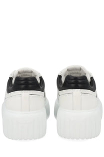 Hogan women’s stripes sneaker white platform sneaker with chunky sole and sleek leather upper in white and black