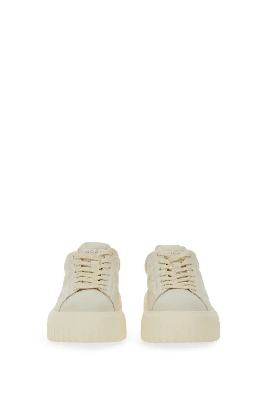 Cream-colored Hogan women’s stripes platform sneakers with sleek minimalist design and subtle tongue branding
