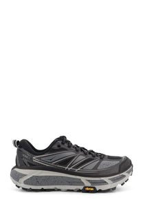 Black and gray hoka one one arahi 4 trail running shoe with speckled midsole and vibram outsole for men