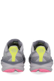 Gray and neon yellow hoka one one unisex clifton gtx sneaker with chunky sole and pink rubber outsole