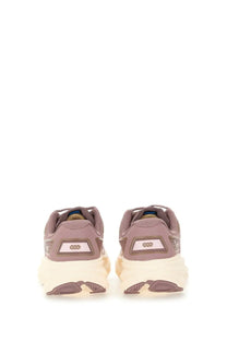 Pair of taupe and cream hoka one one clifton one9 sneakers with chunky cushioned sole for unisex use