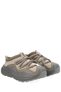 Beige and gray hoka unisex now first sneaker with quilted upper thick rubber sole and white plastic eyelets