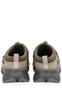 Beige and gray hoka unisex now first sneaker with fabric upper and textured rubber sole in brown tone