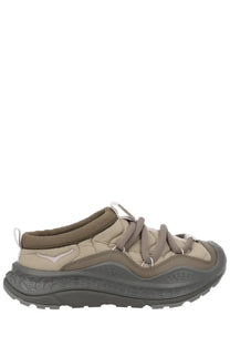 Beige and gray Hoka unisex now first sneaker with quilted upper laces and textured rubber sole in brown color