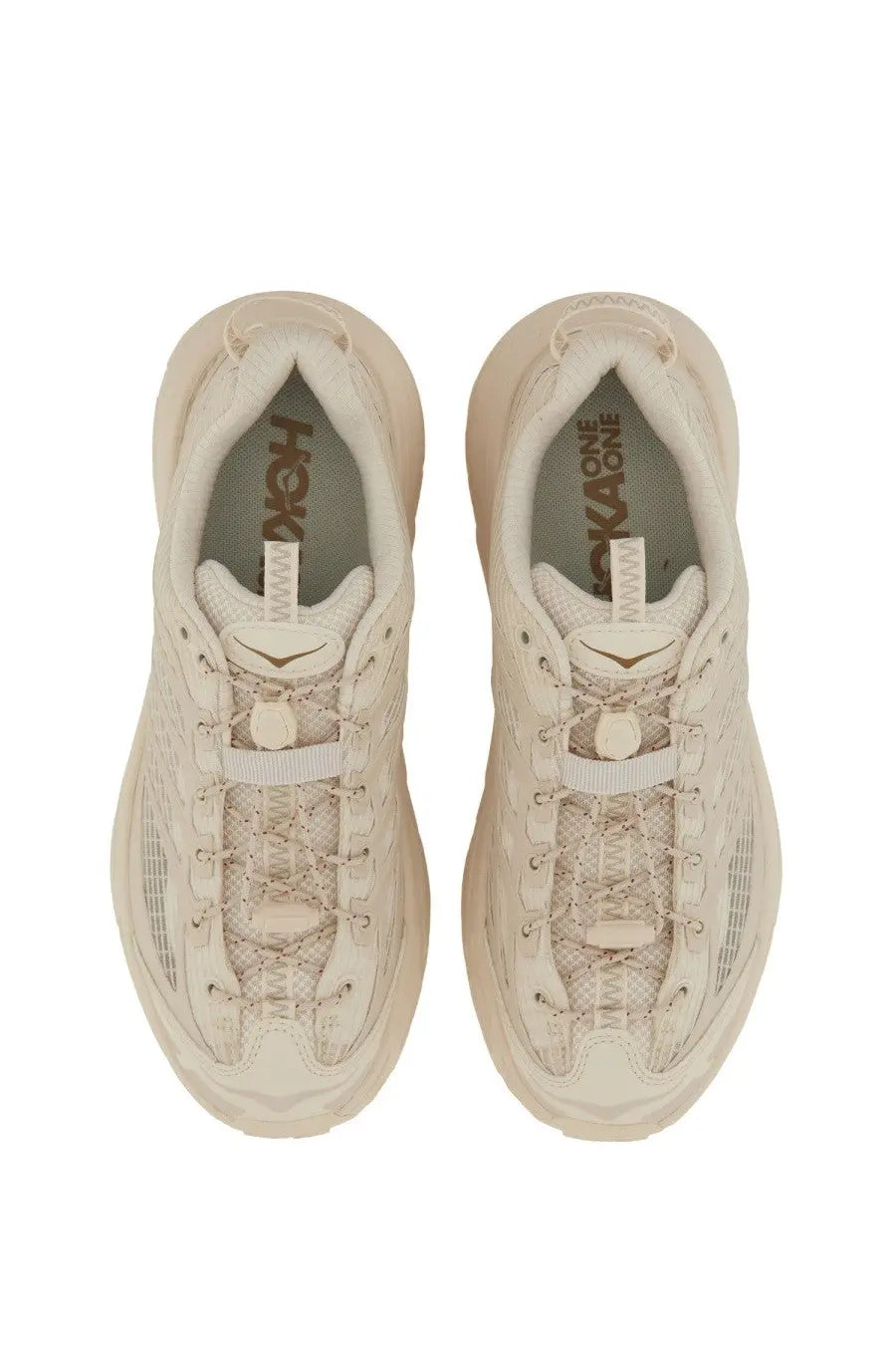 Beige hoka unisex mafate three2 running shoes with mesh and synthetic overlays and a chunky midsole